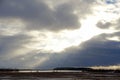 The Winter Sun shines through the clouds. December, 25 Royalty Free Stock Photo