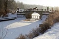 Winter sunny landscape with horse-drawn carriage