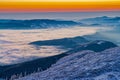 Winter sunrise on mountain mist in valley Royalty Free Stock Photo