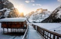 Winter sunrise over the frozen Lago di Braies  in the Dolomites, Italy Royalty Free Stock Photo