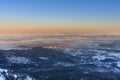 Winter, sunrise time, Karpacz view from Snezka , krkonose mountains. Snezka is mountain on the border between Czech Republic and