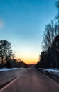 Winter sunset, evening road, infinity