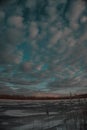 Winter sunset. Frozen Lake. Blue sky. Beautiful melancholy nature. Royalty Free Stock Photo