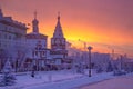 Winter sunset landscape of frosty trees, white snow in city park. Trees covered with snow in Siberia, Irkutsk near lake Baikal. Royalty Free Stock Photo