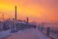 Winter sunset landscape of frosty trees, white snow in city park. Trees covered with snow in Siberia, Irkutsk near lake Baikal.