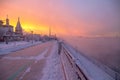 Winter sunset landscape of frosty trees, white snow in city park. Trees covered with snow in Siberia, Irkutsk near lake Baikal. Royalty Free Stock Photo