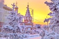 Winter sunset landscape of frosty trees, white snow in city park. Trees covered with snow in Siberia, Irkutsk near lake Baikal. Royalty Free Stock Photo