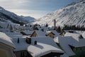 Winter sunset over Andermatt village and its church