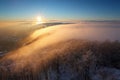 Winter sunset over the clouds Royalty Free Stock Photo
