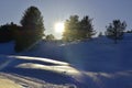 Winter sunset over snowy fields Royalty Free Stock Photo