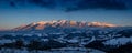 Winter sunset panorama in the Carpathians as seen from the Pestera Village near the Rucar-Bran Pass Royalty Free Stock Photo