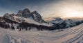 Winter sunset panorama of dolomite hut at the foots of north face of Mount Pelmo Royalty Free Stock Photo