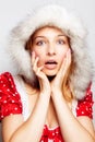 Winter surprise - cute amazed young woman Royalty Free Stock Photo