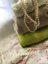 Winter sweaters and pearl necklace Royalty Free Stock Photo