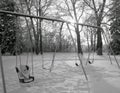 Set of swings in winter snow