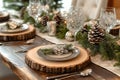 winter table decor, a cozy winter table setting with rustic bark chargers, spruce sprigs, and sparkling snowflake