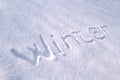 Winter text on snow.