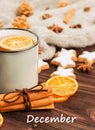 Winter theme. Cup of hot tea with spices, orange, cinnamon, anis