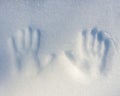 Winter theme two handprints in the snow