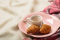 Winter time. A cozy warm pink blanket and a cup of coffee and cr