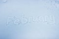February handwritten on fresh snow