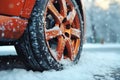 Winter tire covered in snow snowy road ice icy car wheel drive safety safe driving transportation condition change Royalty Free Stock Photo