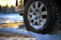 Winter tire covered in snow snowy road ice icy car wheel drive safety safe driving transportation condition change Royalty Free Stock Photo