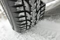 Winter Tire in Deep Snow with Deep Track Royalty Free Stock Photo