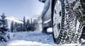 Winter tire. Detail of car tires in winter on the road covered with snow. Panorama  banner Royalty Free Stock Photo