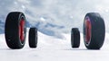 Winter tires on a background of snowstorm, snowfall and slippery winter road. Winter tires concept. Concept tyres Royalty Free Stock Photo