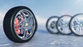 Winter tires on a background of snowstorm, snowfall and slippery winter road. Winter tires concept. Concept tyres Royalty Free Stock Photo