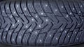 Winter tires for the car. Radial tread, thin lamellas and metal spikes