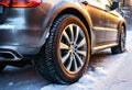 Winter tires on a car in snow. Generative AI