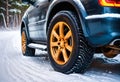 Winter tires on a car in snow. Generative AI