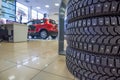 Winter tires in showroom of a car dealer Royalty Free Stock Photo