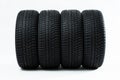 Winter tires with structured adhesion surface in line