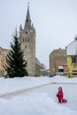 Girl enjoys winter joys in Latvia.