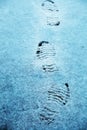 Winter traces boots snow Royalty Free Stock Photo