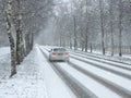 Winter traffic cars. Winter country road in snowfall