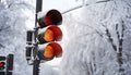 Winter traffic, snow covered road, stoplight, danger sign generated by AI Royalty Free Stock Photo