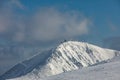 Winter trail leading to the edge of the mountain to the summit of Snezka from the Polish side of the mountain. Snezka hill with Ob Royalty Free Stock Photo