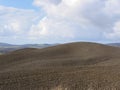 Winter Tuscany landscape with plowed fields at morning