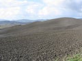 Winter Tuscany landscape with plowed fields at morning