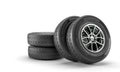 winter tyres with modern rims on a white background
