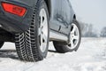 Winter tyres wheels installed on suv car outdoors