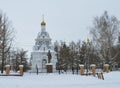 Winter urban landscape with snow from buildings and Orthodox Church Royalty Free Stock Photo