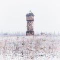 Winter view on an abandoned 19th century ironworks building