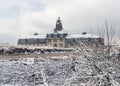 Winter view on an abandoned 19th century ironworks building