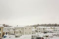 Winter view of country village with white houses covered with snow. Beautiful landscape background. Royalty Free Stock Photo