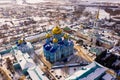 Aerial view of the Nativity-Bogoroditsky monastery surrounded by residential buildings in Zadonsk